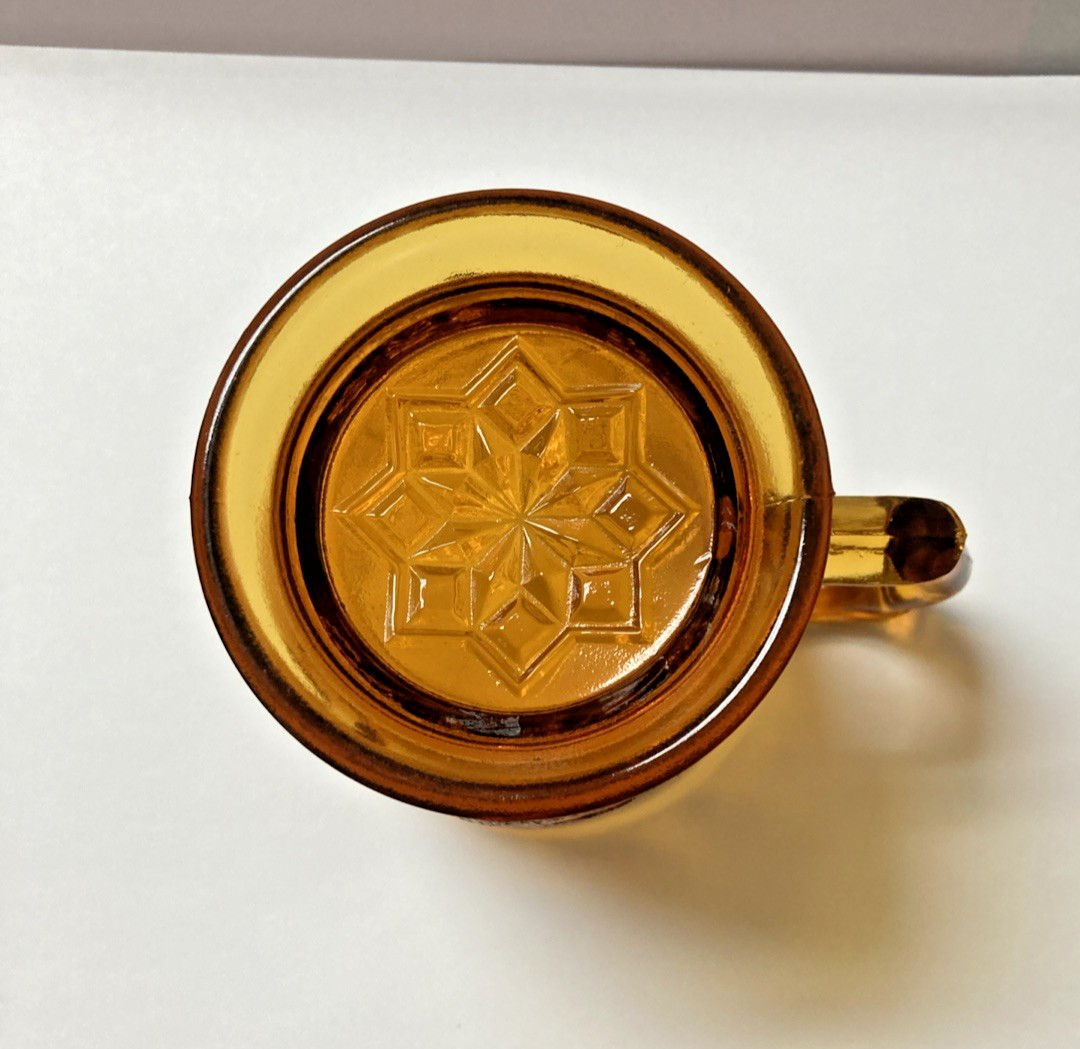 c 1880’s Amber mug No. 1203 “Robin in Tree” by Bryce Brothers