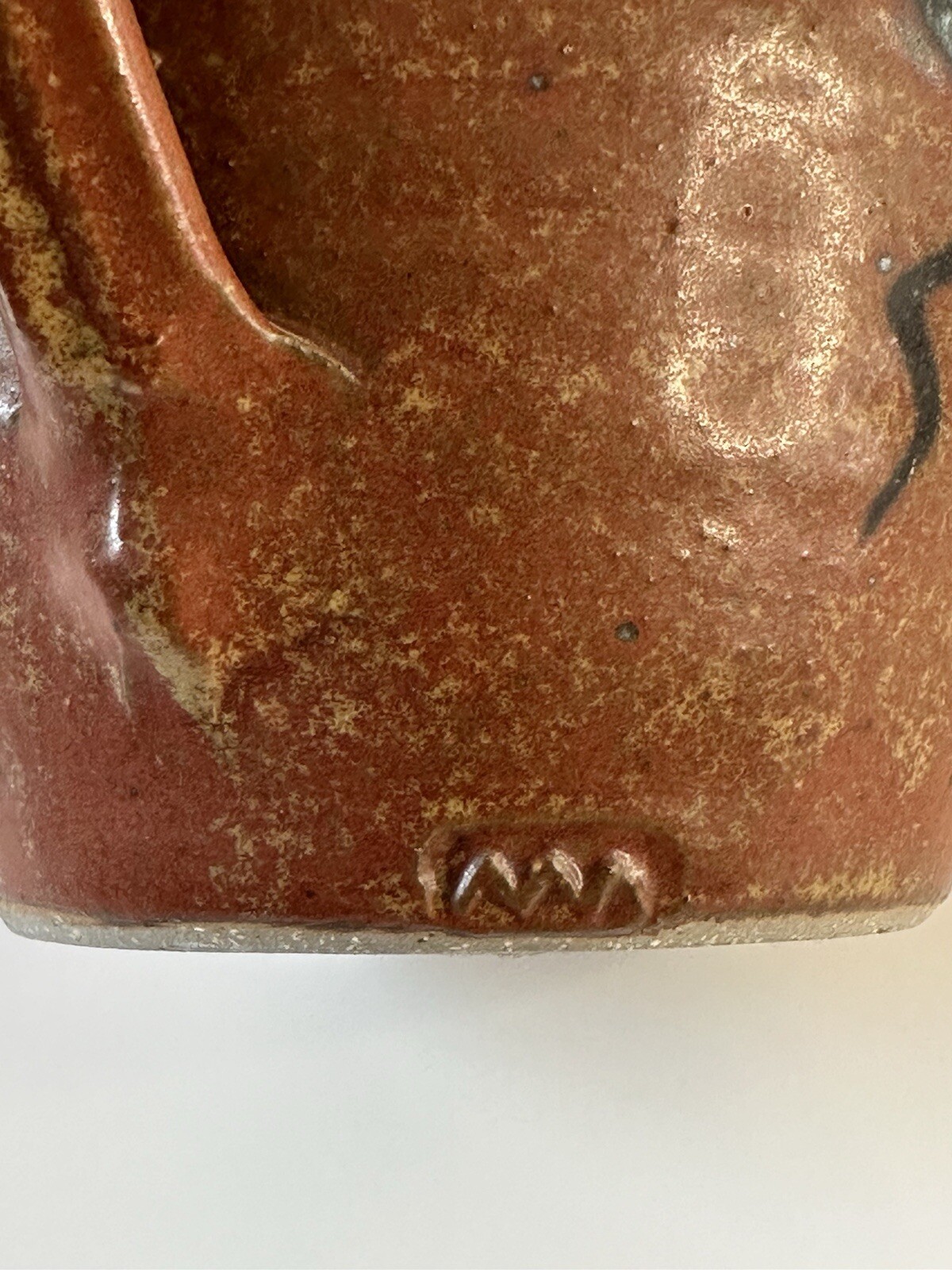 Signed AM stoneware jug, gray, tan, rust, blue, brown. Earthy Natural colors.
