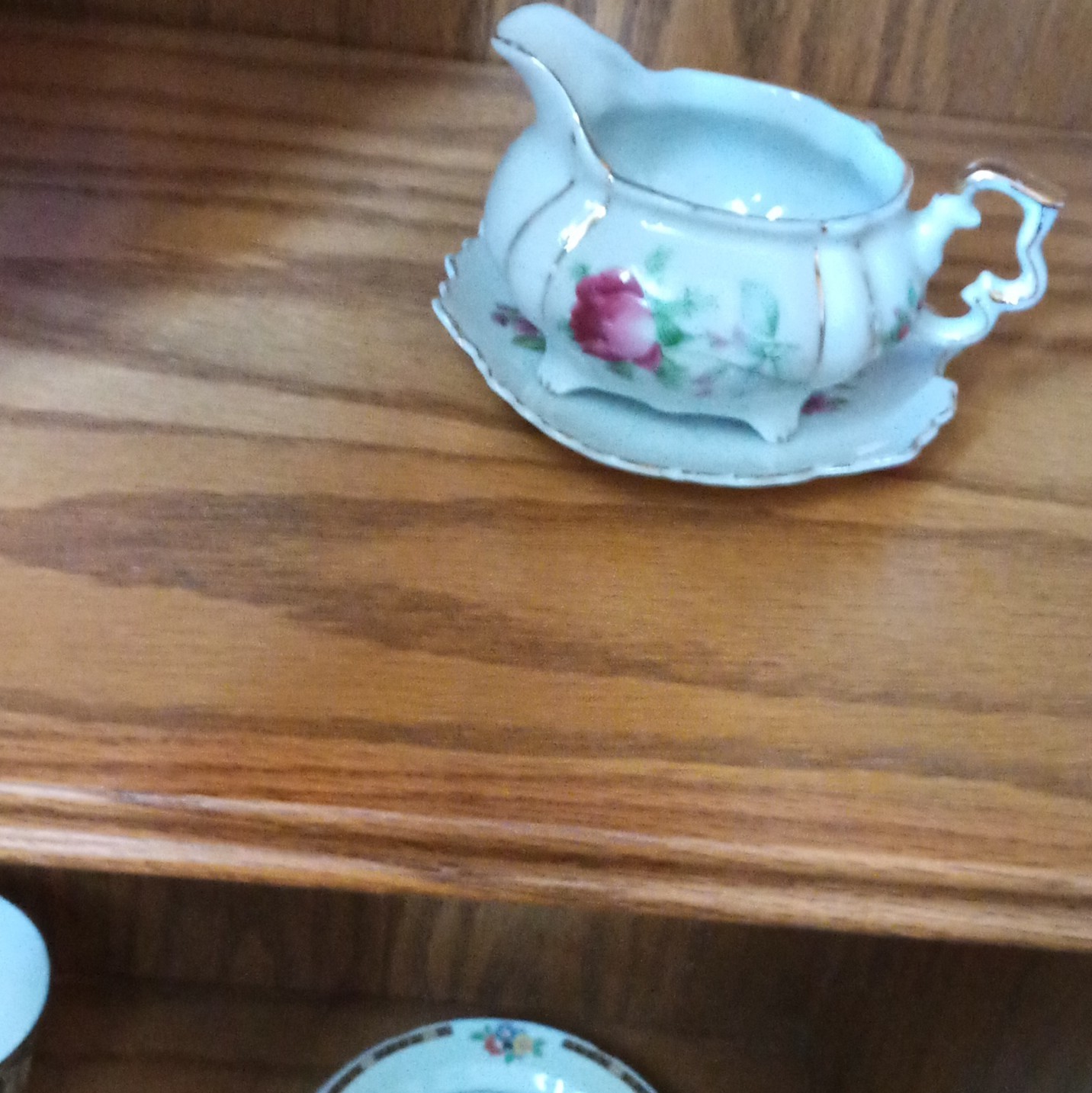 Porcelain Floral Creamer and Saucer Set Japan White Pink Green Gold Handles