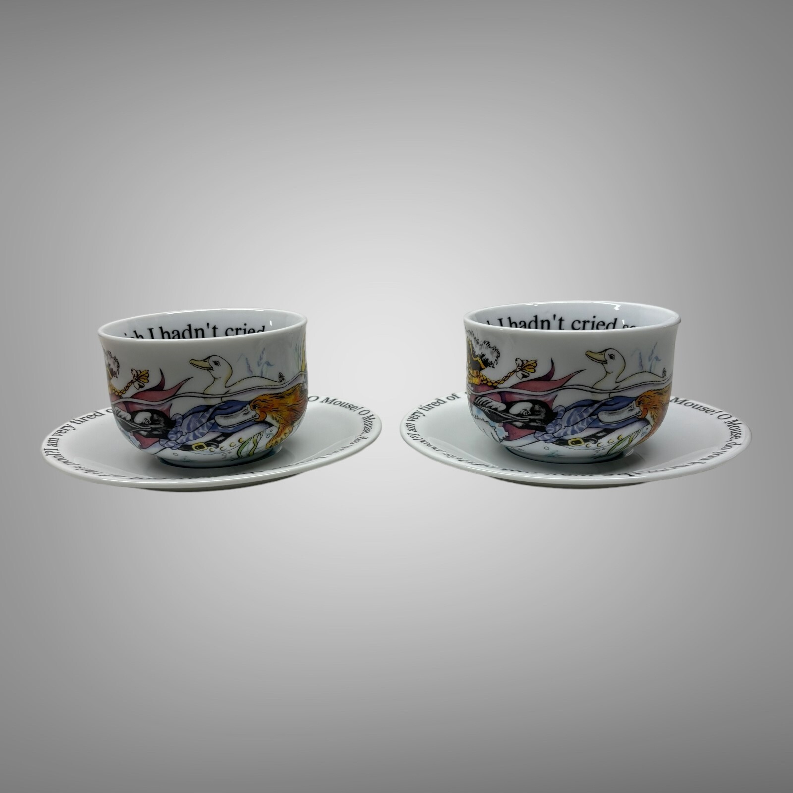 New 2010 Paul Cardew Alice in Wonderland Cafe Teacup & Saucers Set of 2 England