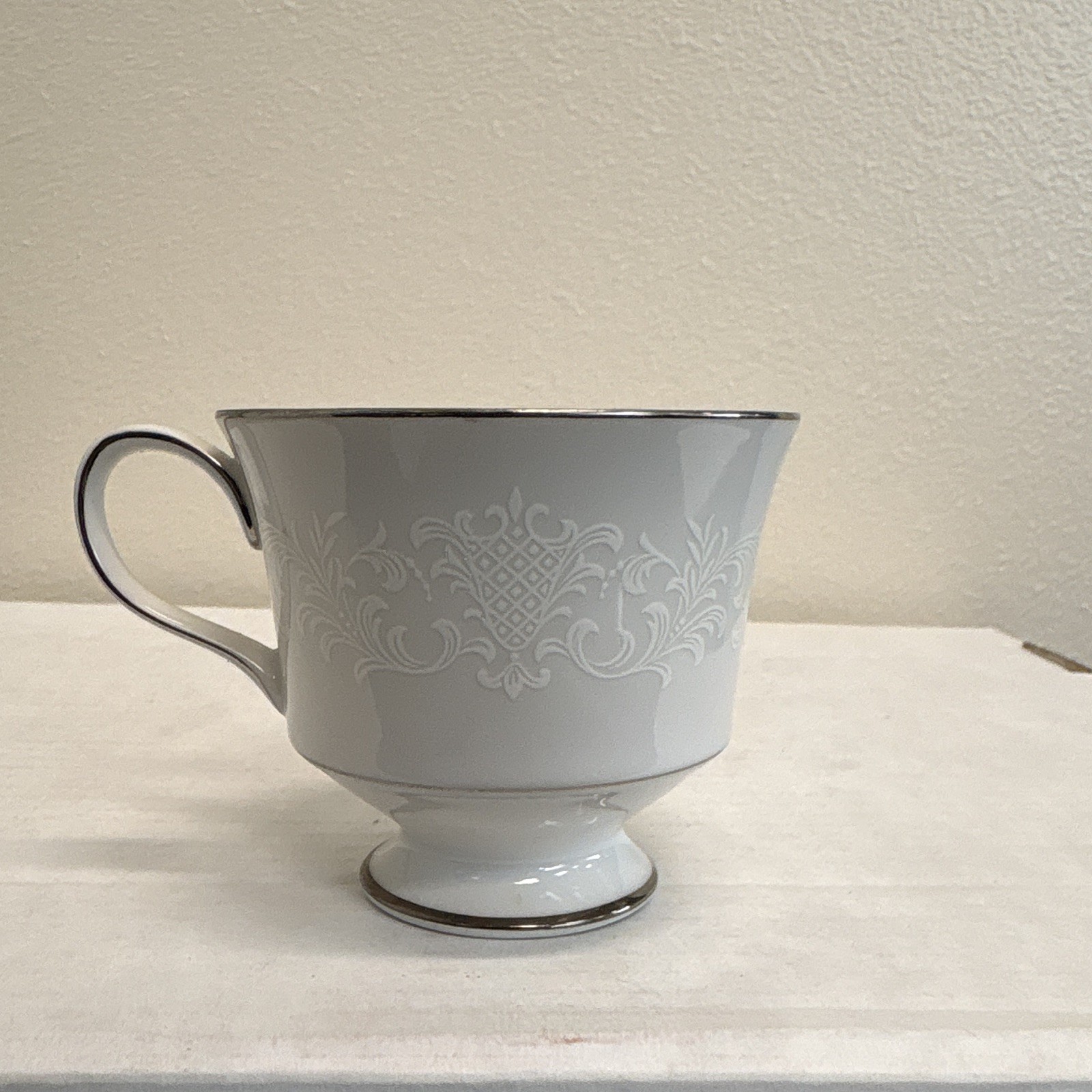 White Sango China Japan Set With White Engravings With Black Rims