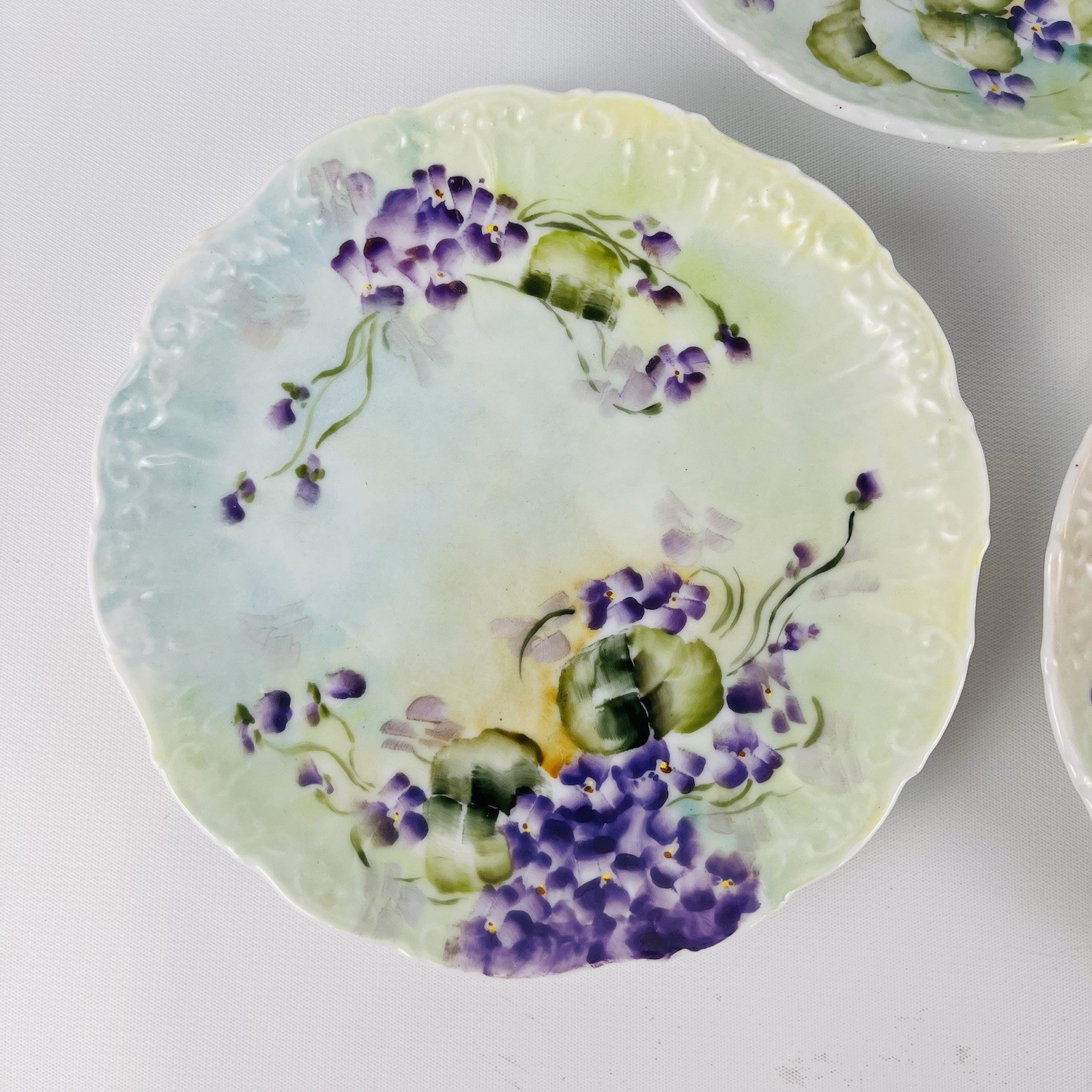 5 Antique Hand Painted Purple Violets 6″ Scalloped Dessert Cabinet Wall Plates