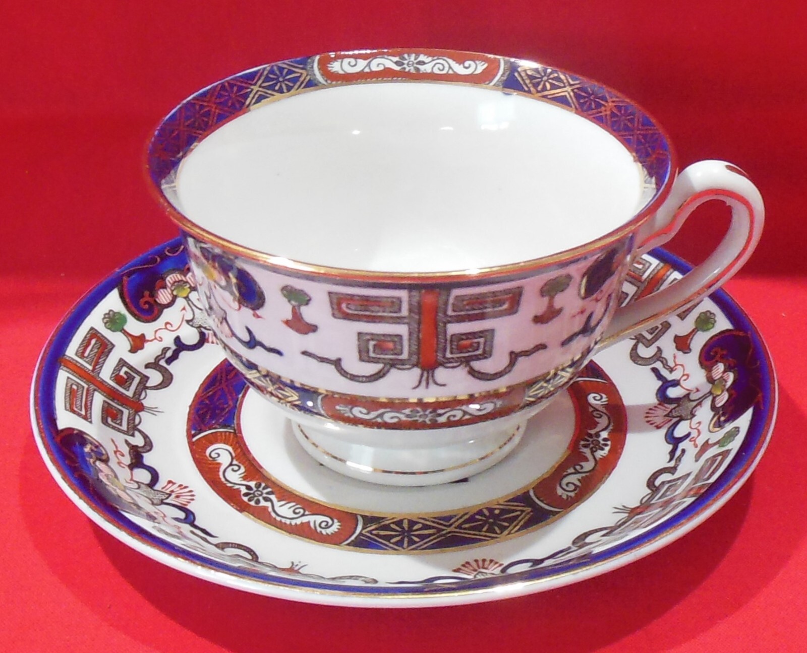 Nikko Ironstone Footed Cup & Saucer Set Blue Rust Gold Floral H491