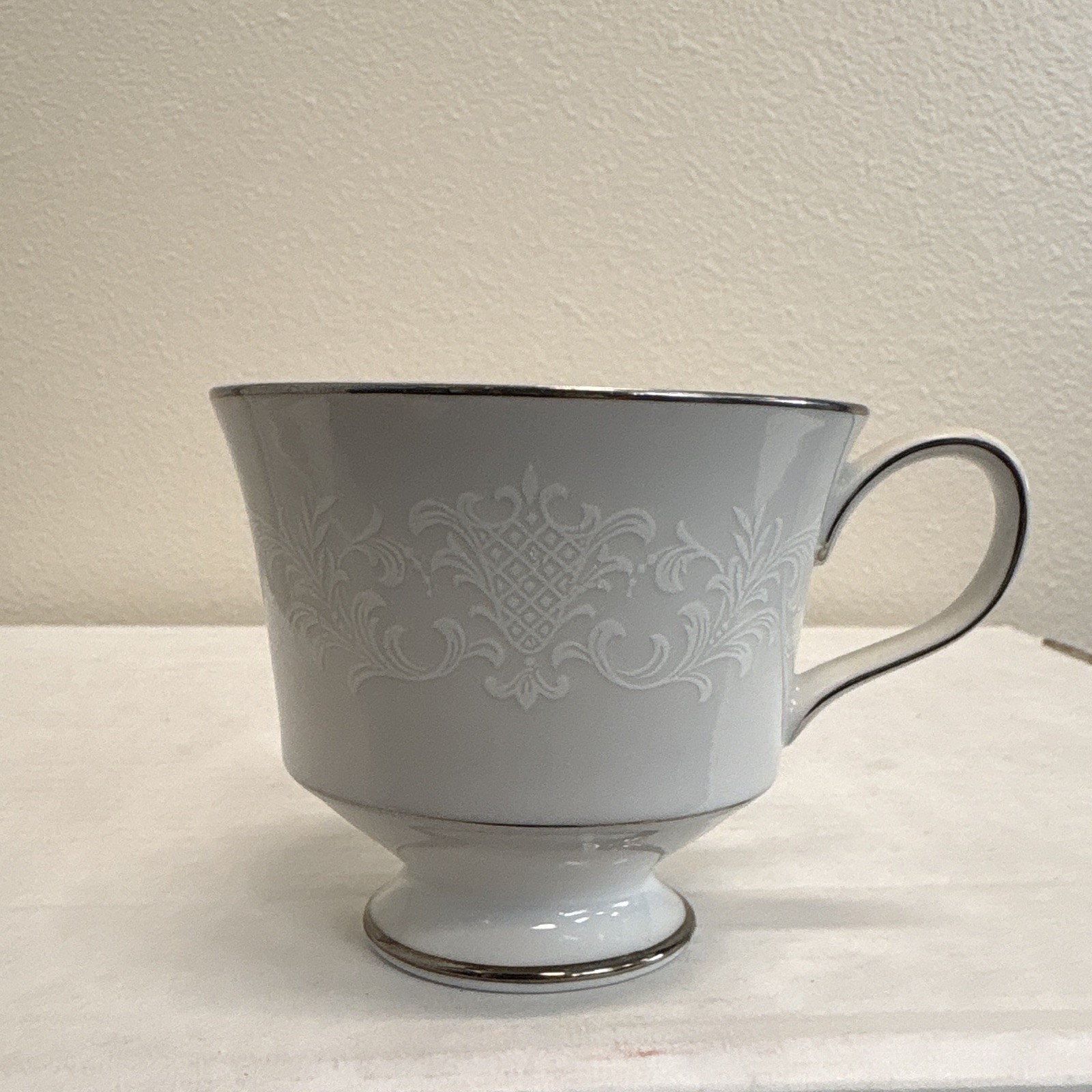 White Sango China Japan Set With White Engravings With Black Rims