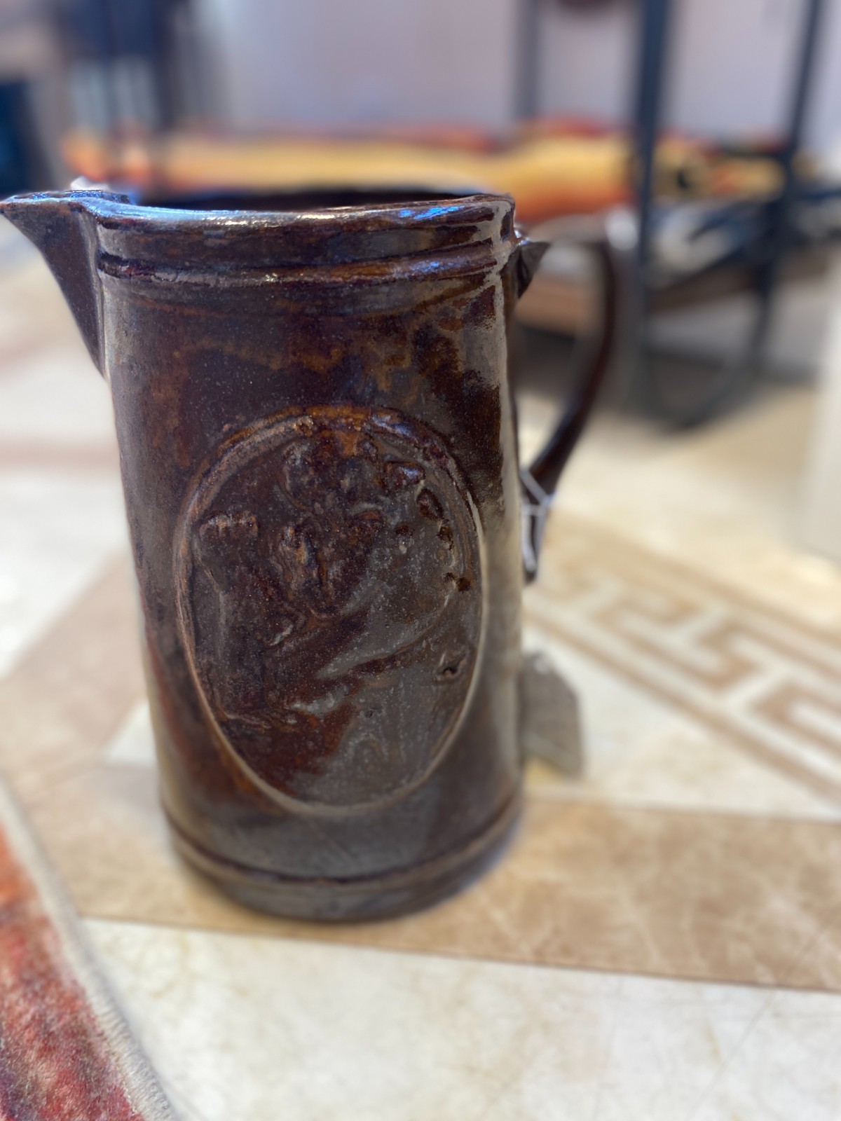 Early (1905 – 1925) Brown “Girl with Dog” Brown Stoneware Salt Glazed Pitcher