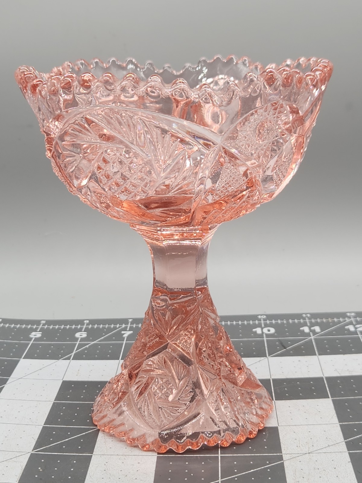 Aztec Heritage Carnival Glass Whirling Star Pedestal Compote Sawtooth Rim Pink