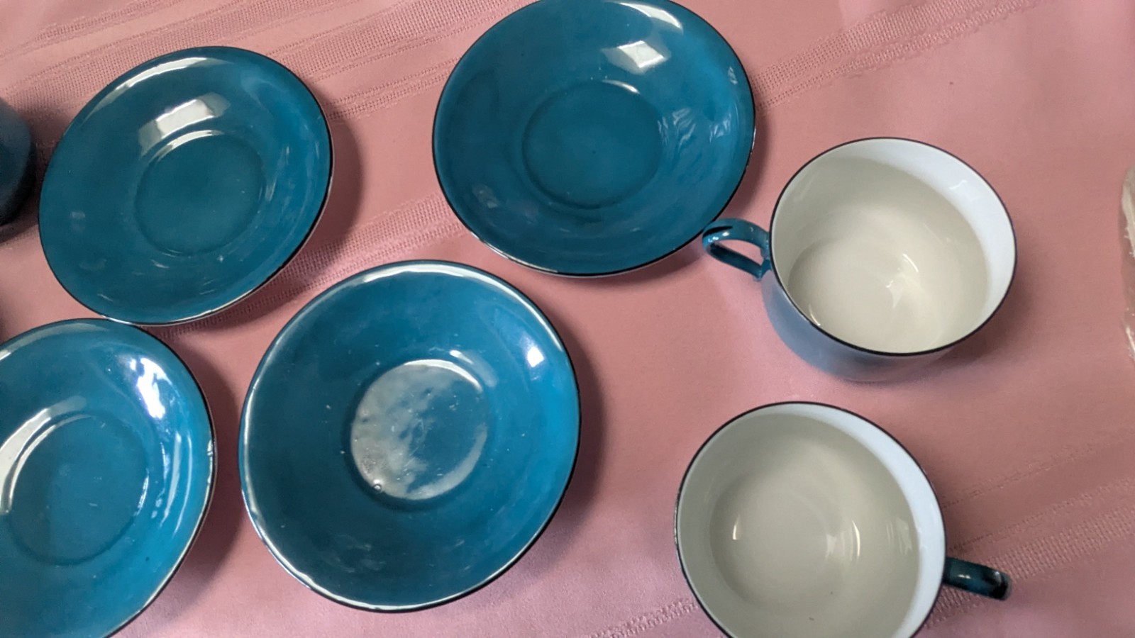 Four piece set cups saucers blue black white Germany