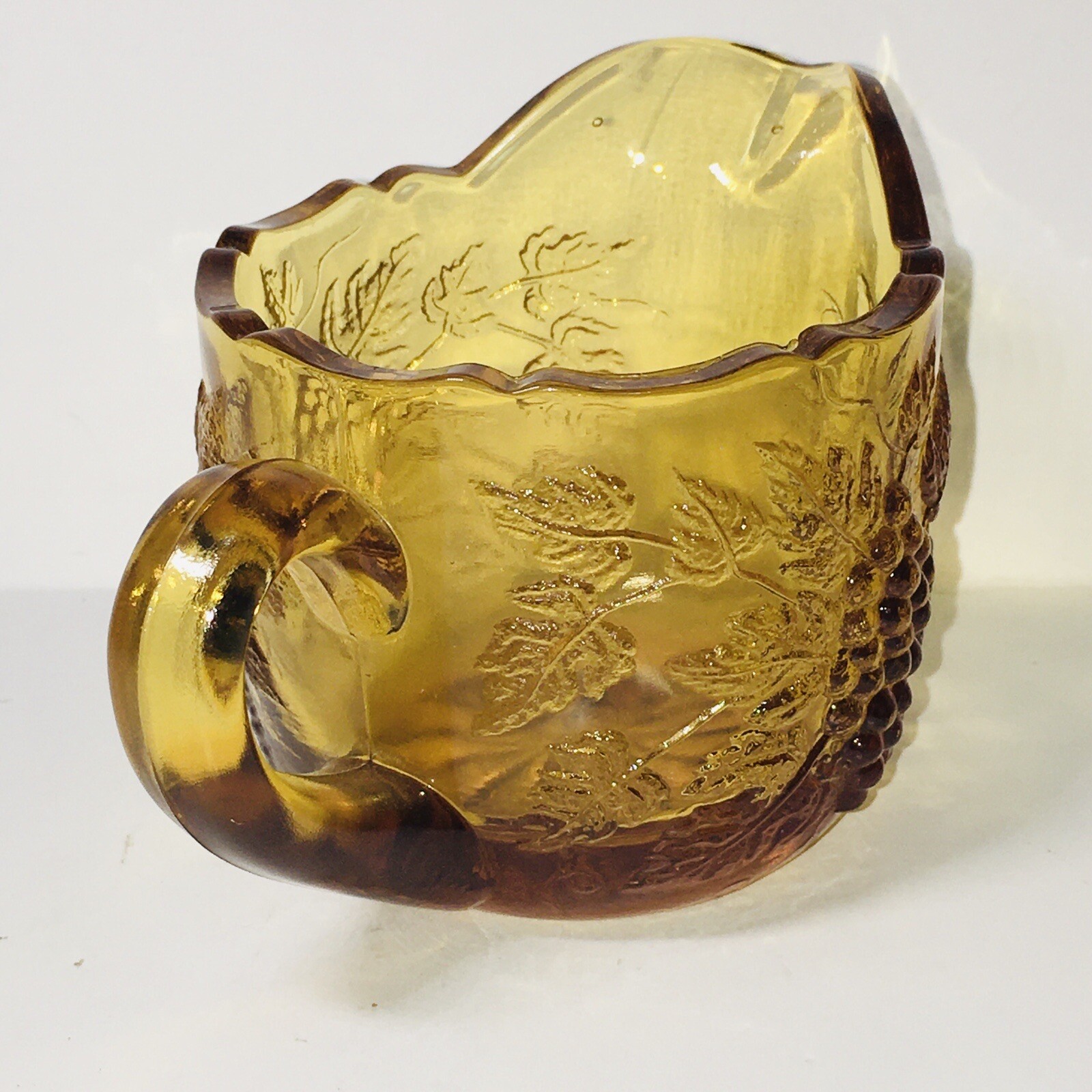 L.E smith Honey Amber pressed Depression glass grapes and leaves pattern creamer