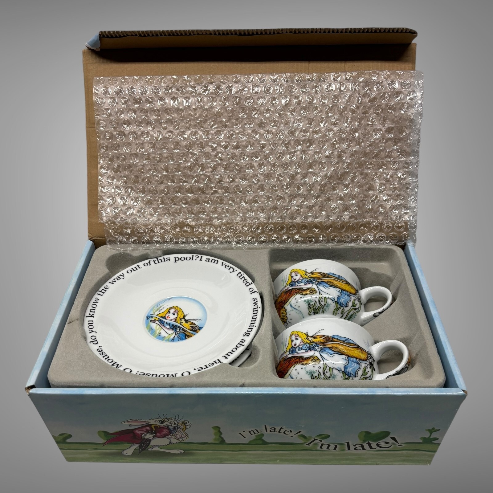 New 2010 Paul Cardew Alice in Wonderland Cafe Teacup & Saucers Set of 2 England