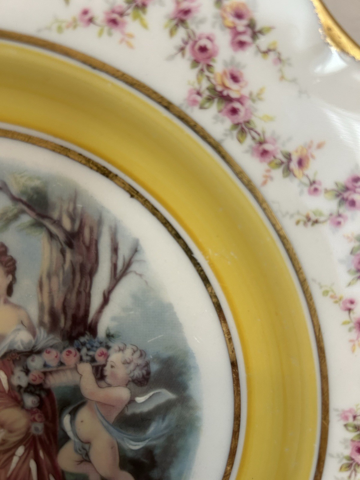 Porcelain Decorative Plate Floral Border Yellow Rim Cherubs & Women Scene