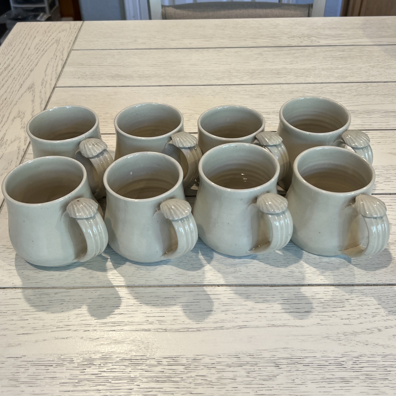 8 Pc Hand Thrown Beige Clay Pottery Coffee Tea Mugs Seashell Handle Stamped Set