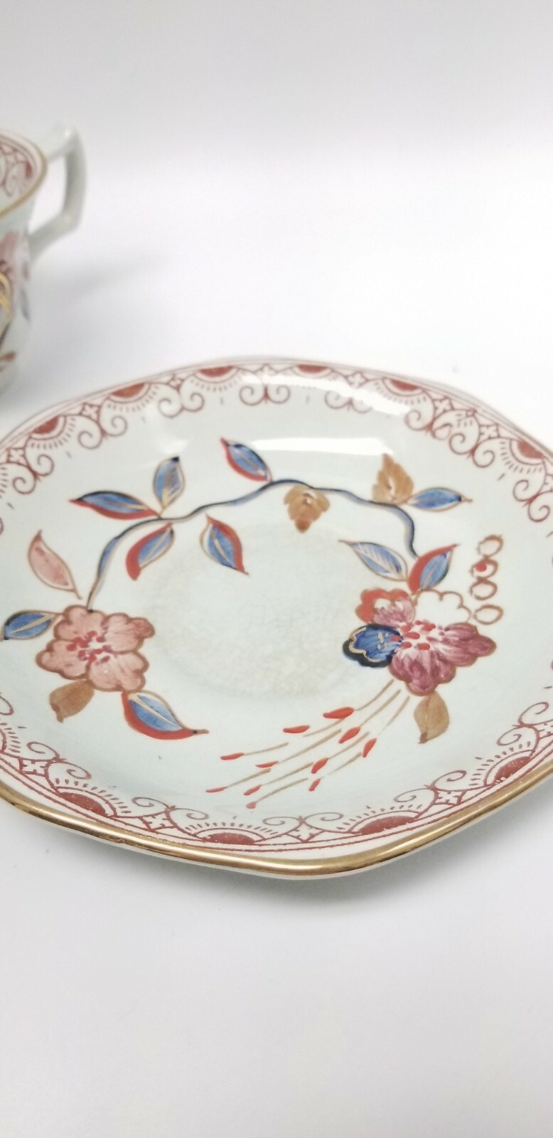 Calyx Ware hand painted 2 teacup saucer set gold light green rust blue England