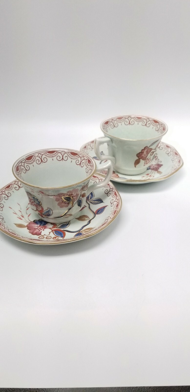 Calyx Ware hand painted 2 teacup saucer set gold light green rust blue England
