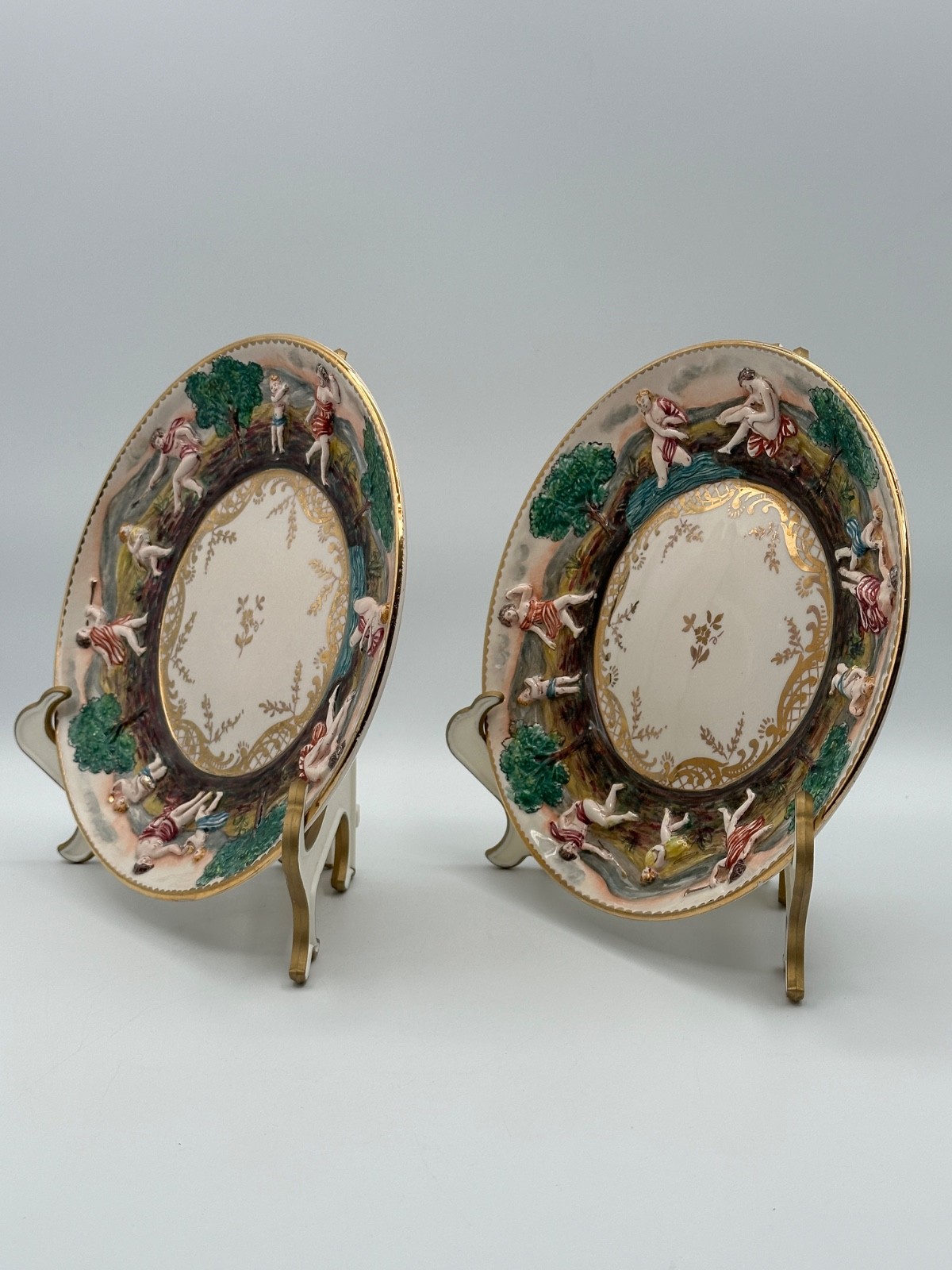 Pair Vintage Italian Capodimonte 7.5” Hand Painted Figural Relief Plates