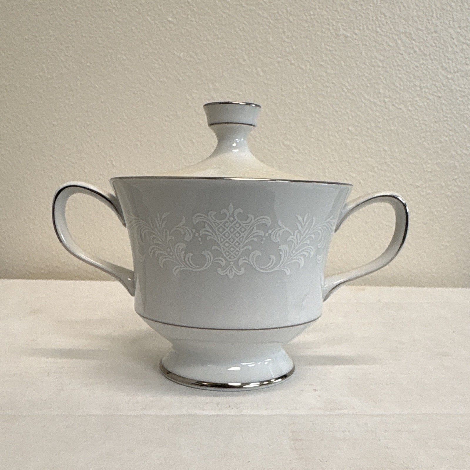 White Sango China Japan Set With White Engravings With Black Rims