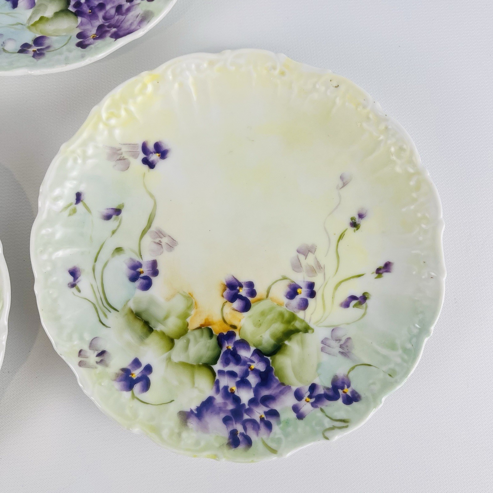 5 Antique Hand Painted Purple Violets 6″ Scalloped Dessert Cabinet Wall Plates