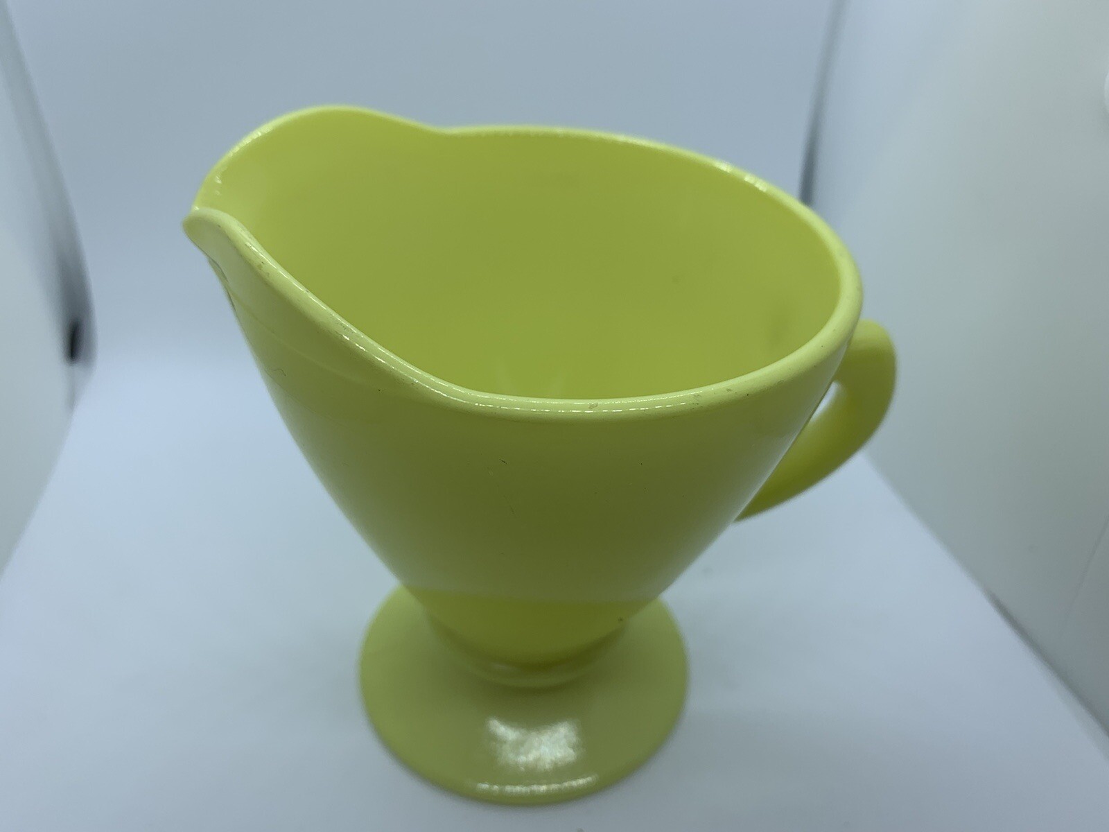 anchor hocking yellow glass pedestal creamer (slight schmutz see picture)