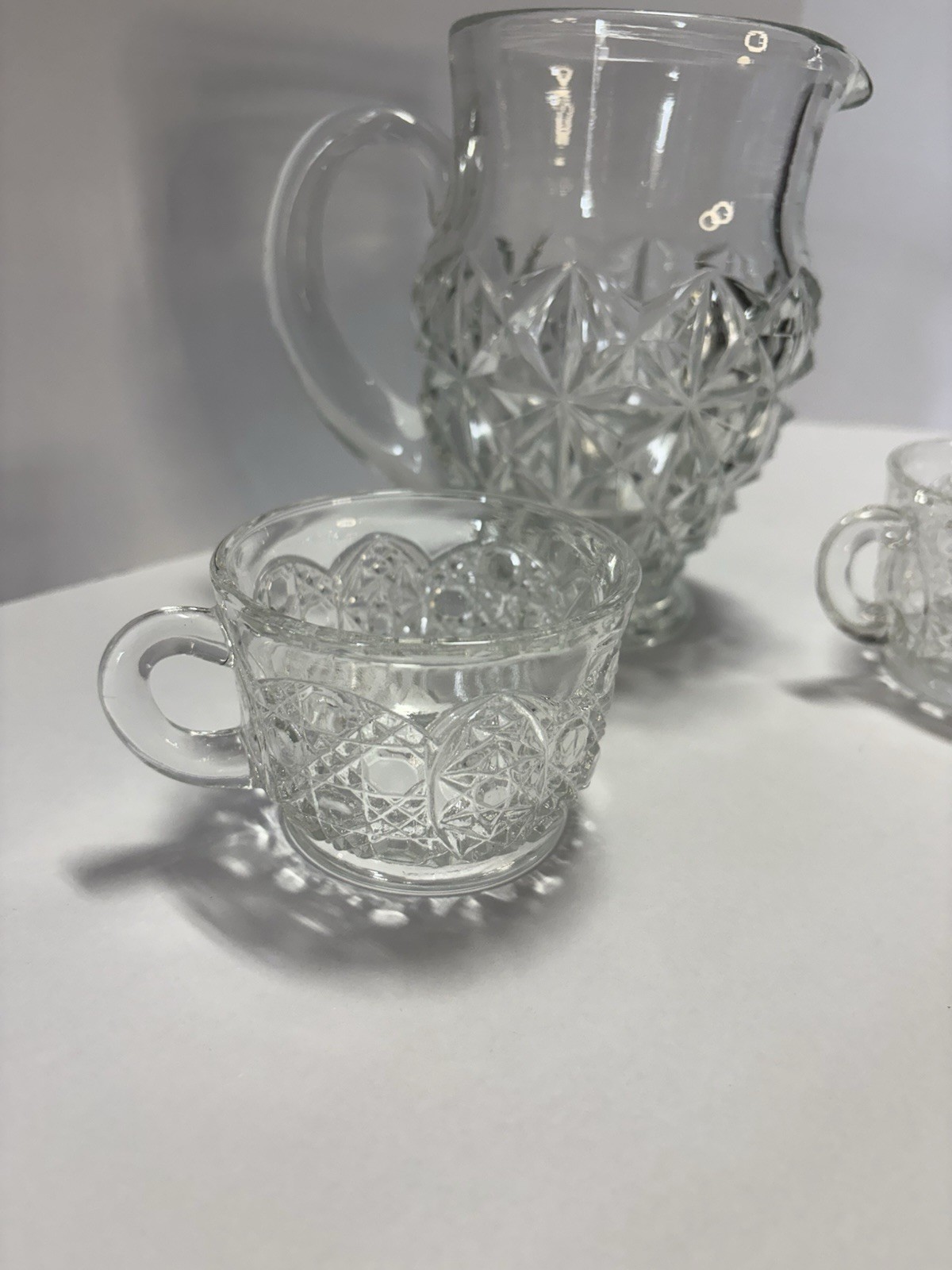 Vintage Clear Pressed Glass Pitcher & 2 Cups Cut Glass Style Starburst Pattern