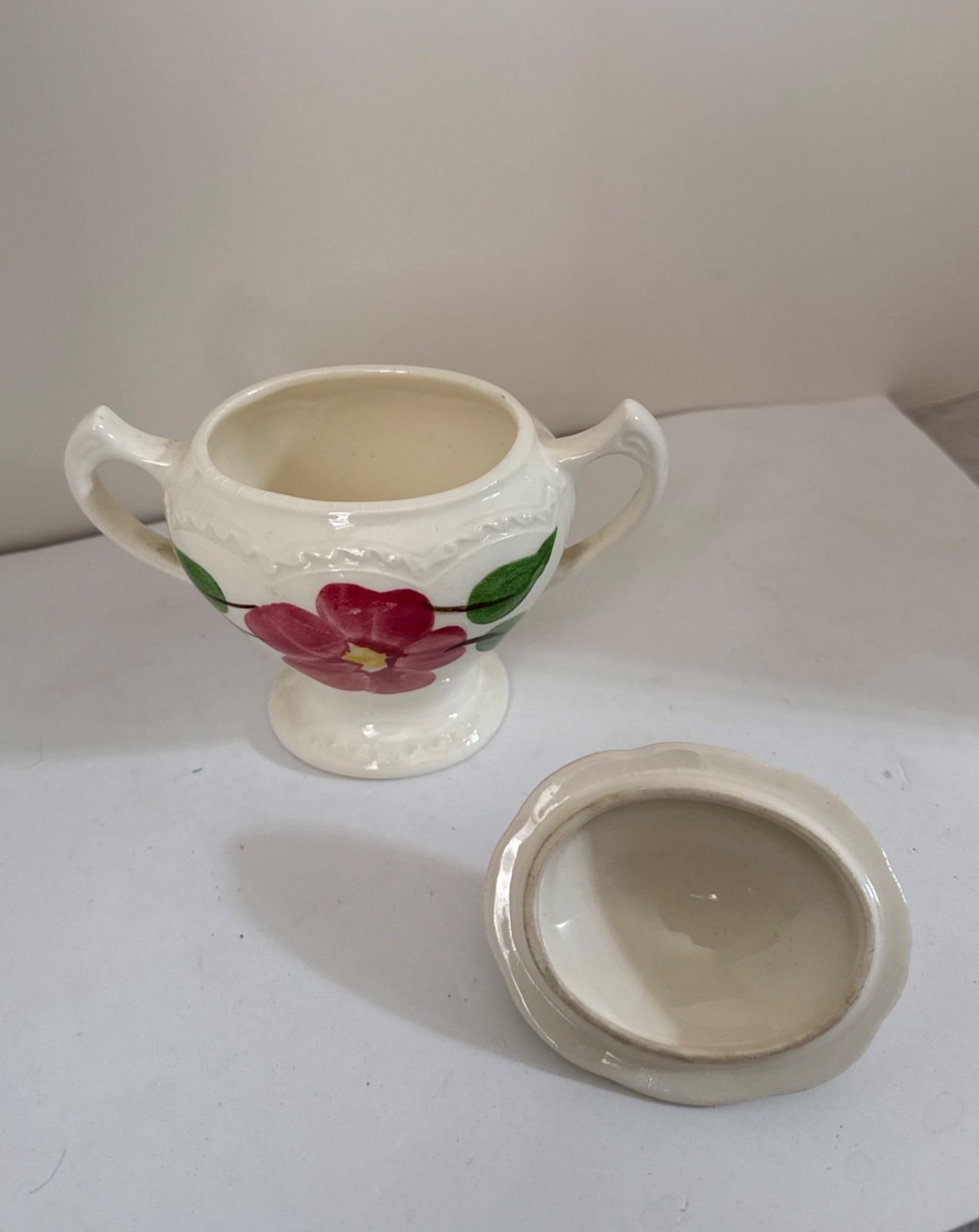5 1/2 Inches High 6” Wide Including Handles