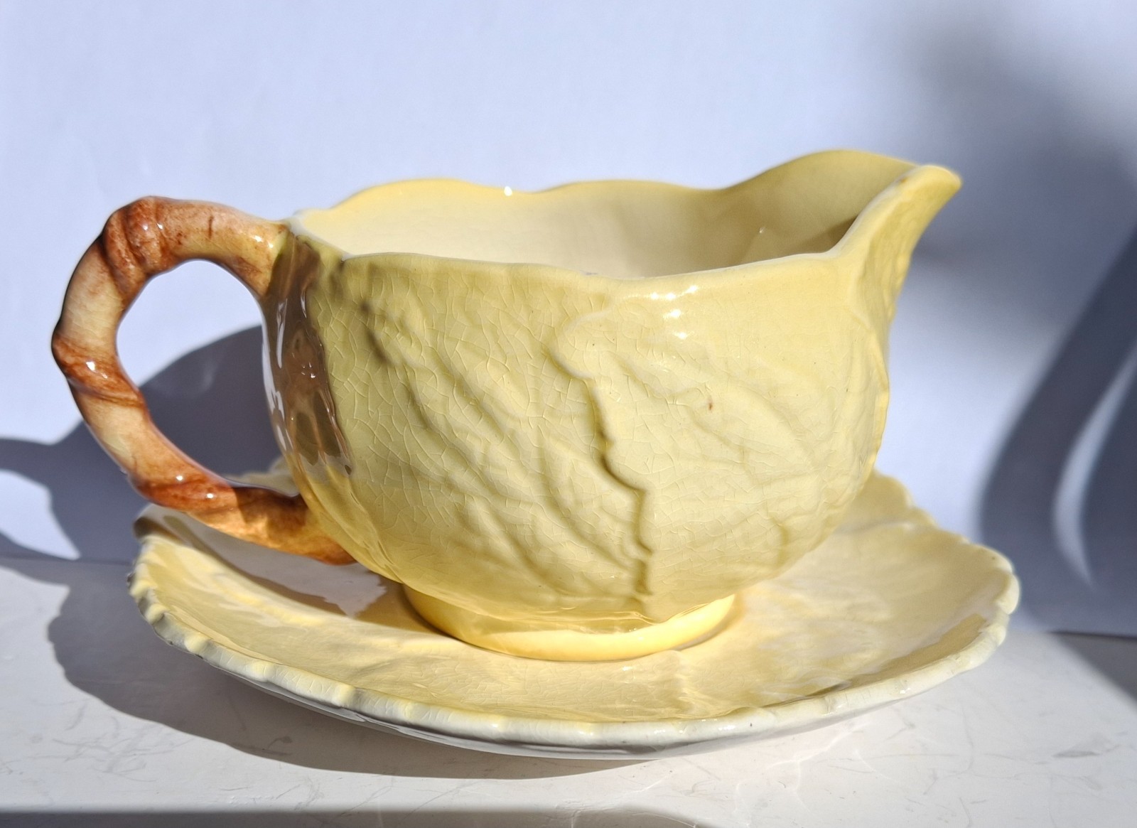 Vintage Carlton Ware creamer and saucer