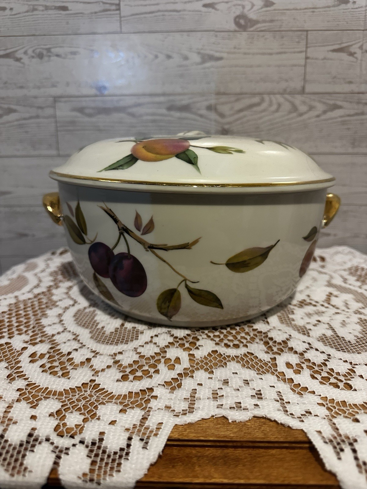 Set of three Royal Worcester Evesham Gold porcelain serving dishes with lids.