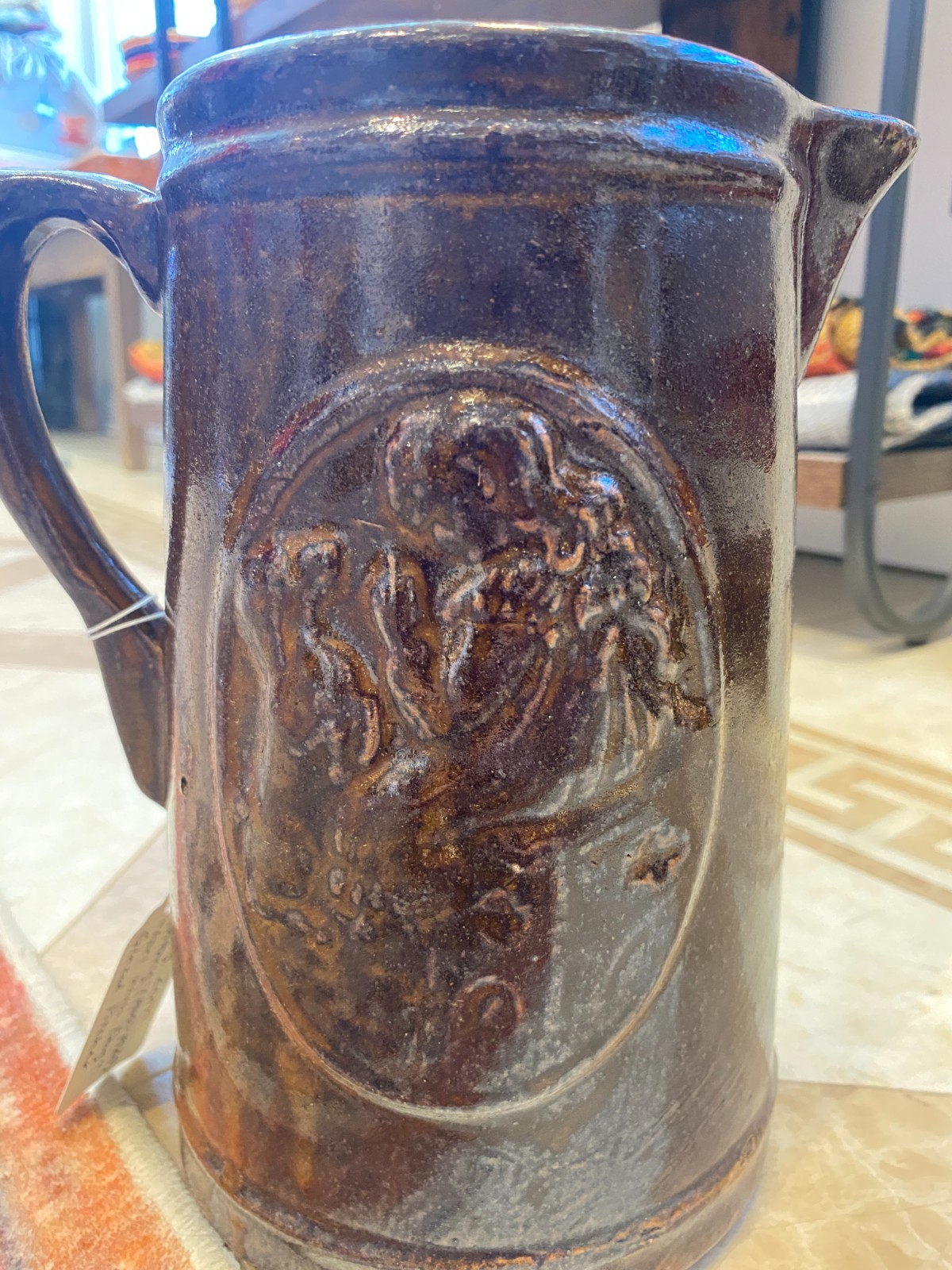 Early (1905 – 1925) Brown “Girl with Dog” Brown Stoneware Salt Glazed Pitcher