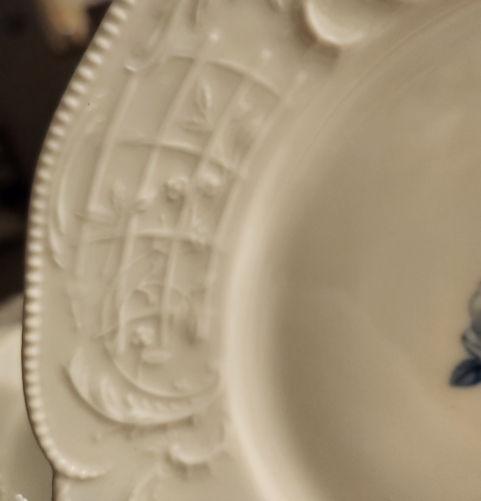 A set of 6 Rosenthal Sanssouci Blue Rose porcelain plates with embossed rims.