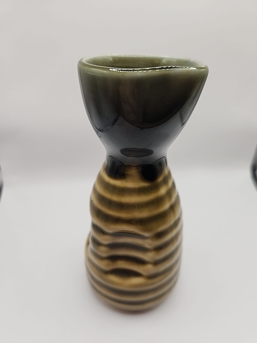 Pottery 5 Inch Tall Grip And Spout Grip Portion resembling Bee Hive top green