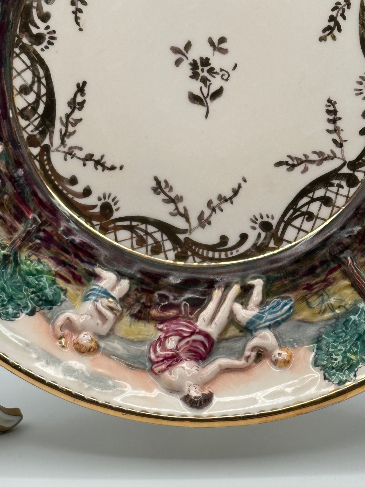 Pair Vintage Italian Capodimonte 7.5” Hand Painted Figural Relief Plates