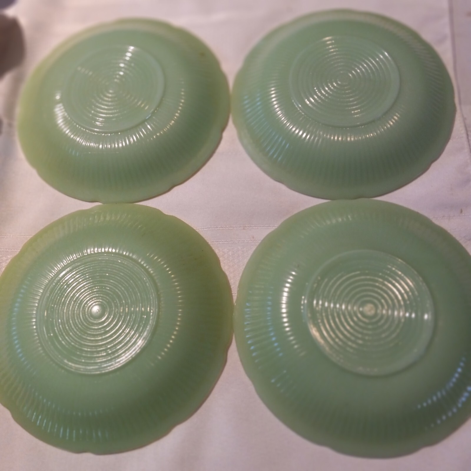 Four ALICE pattern Jadeite Anchor Hocking Saucers Nice Condition Replacecments