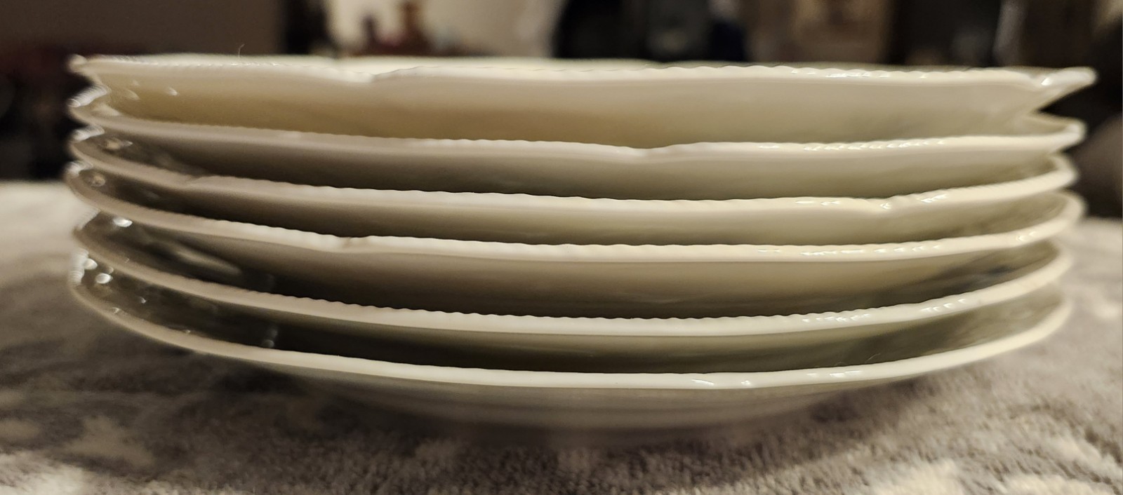 A set of 6 Rosenthal Sanssouci Blue Rose porcelain plates with embossed rims.