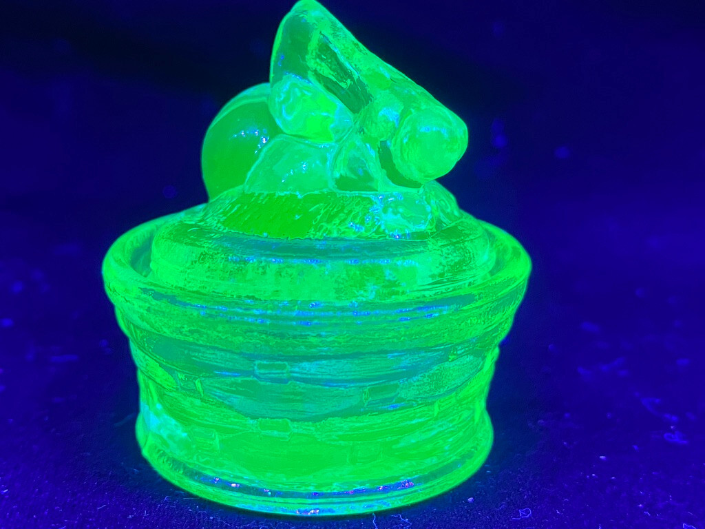 Green Vaseline uranium glass bunny rabbit on nest basket Easter glows teal blue