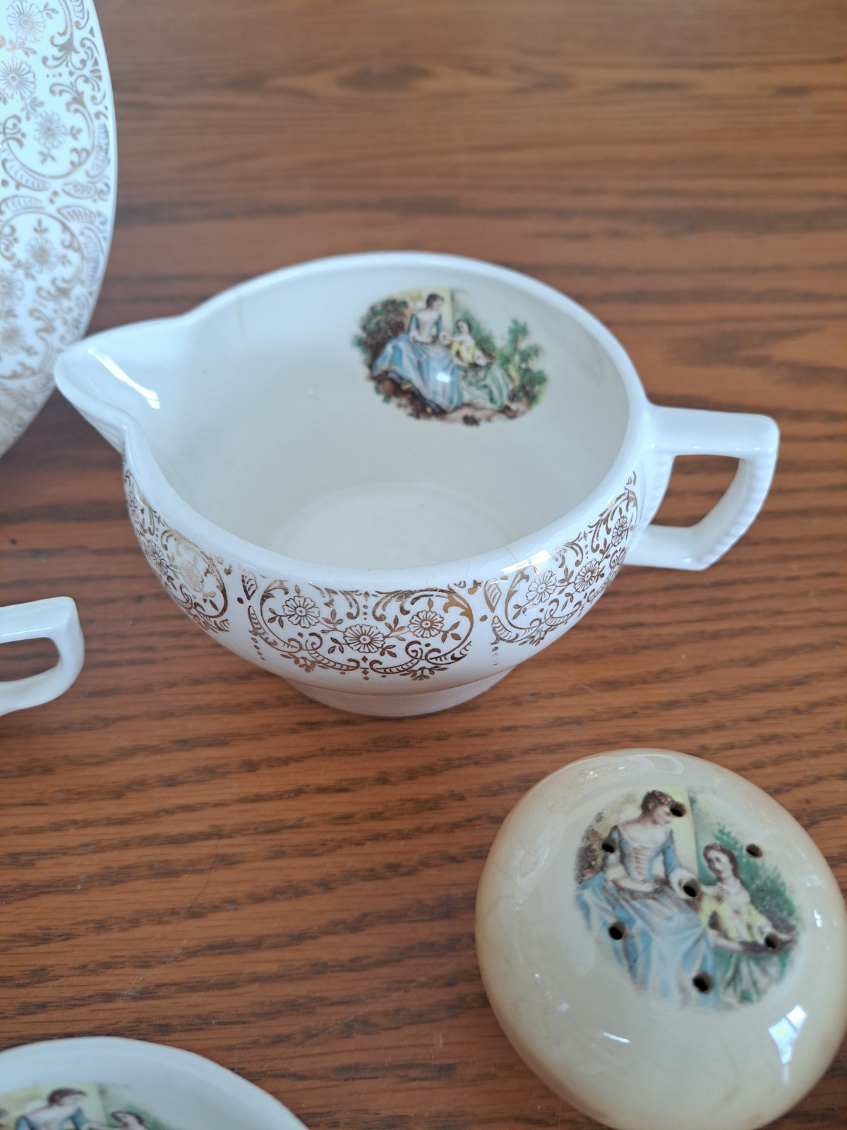 Triumph USA Limoges 22K China Triumph Courting Couples 11 Piece Grouping