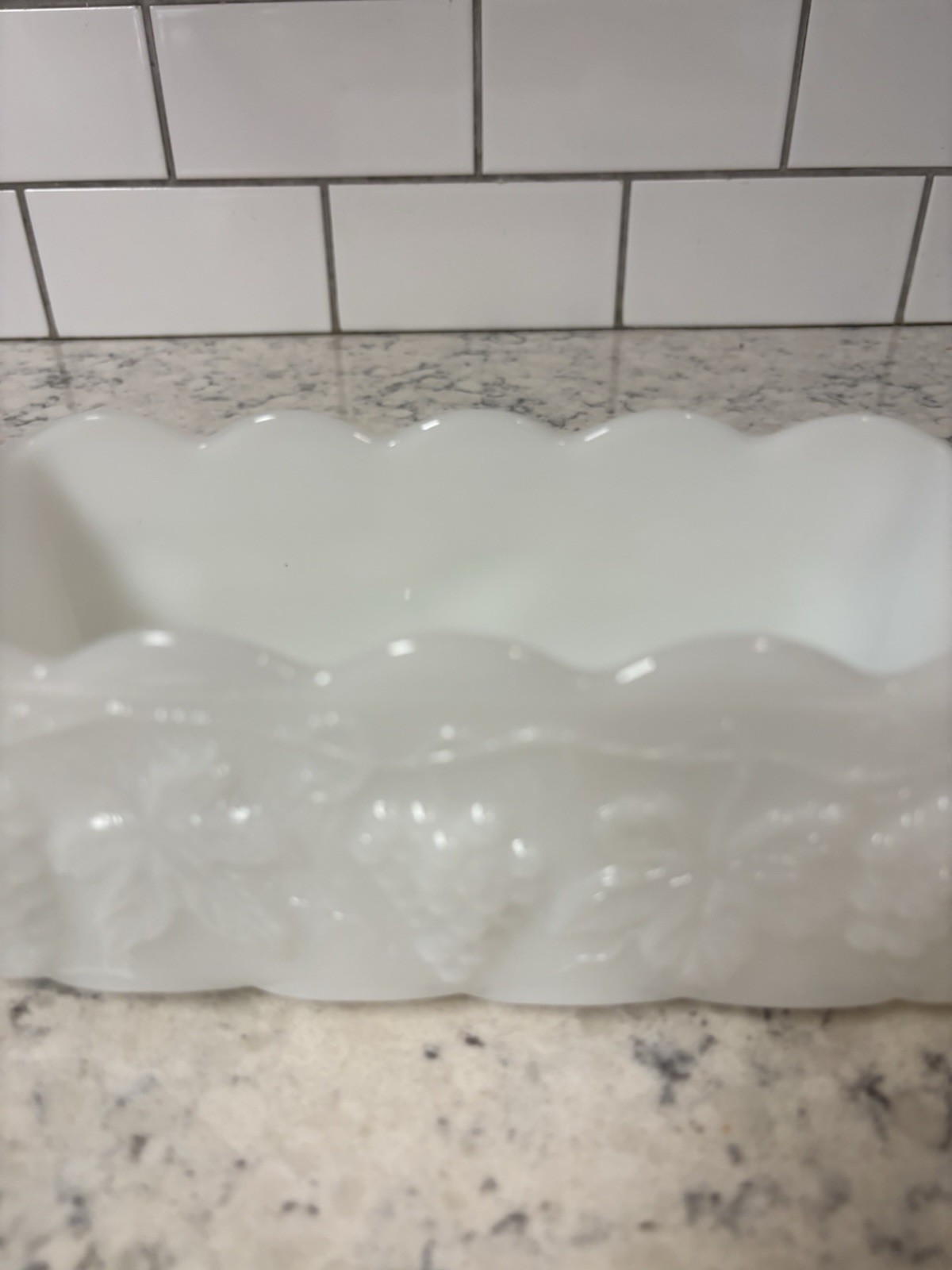 Anchor Hocking Fire King milk glass rectangular dish with grape pattern.