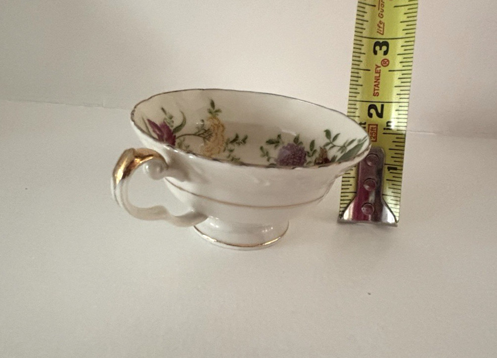 Vintage hand painted porcelain Made In Occupied Japan Tea Cup Floral Pattern