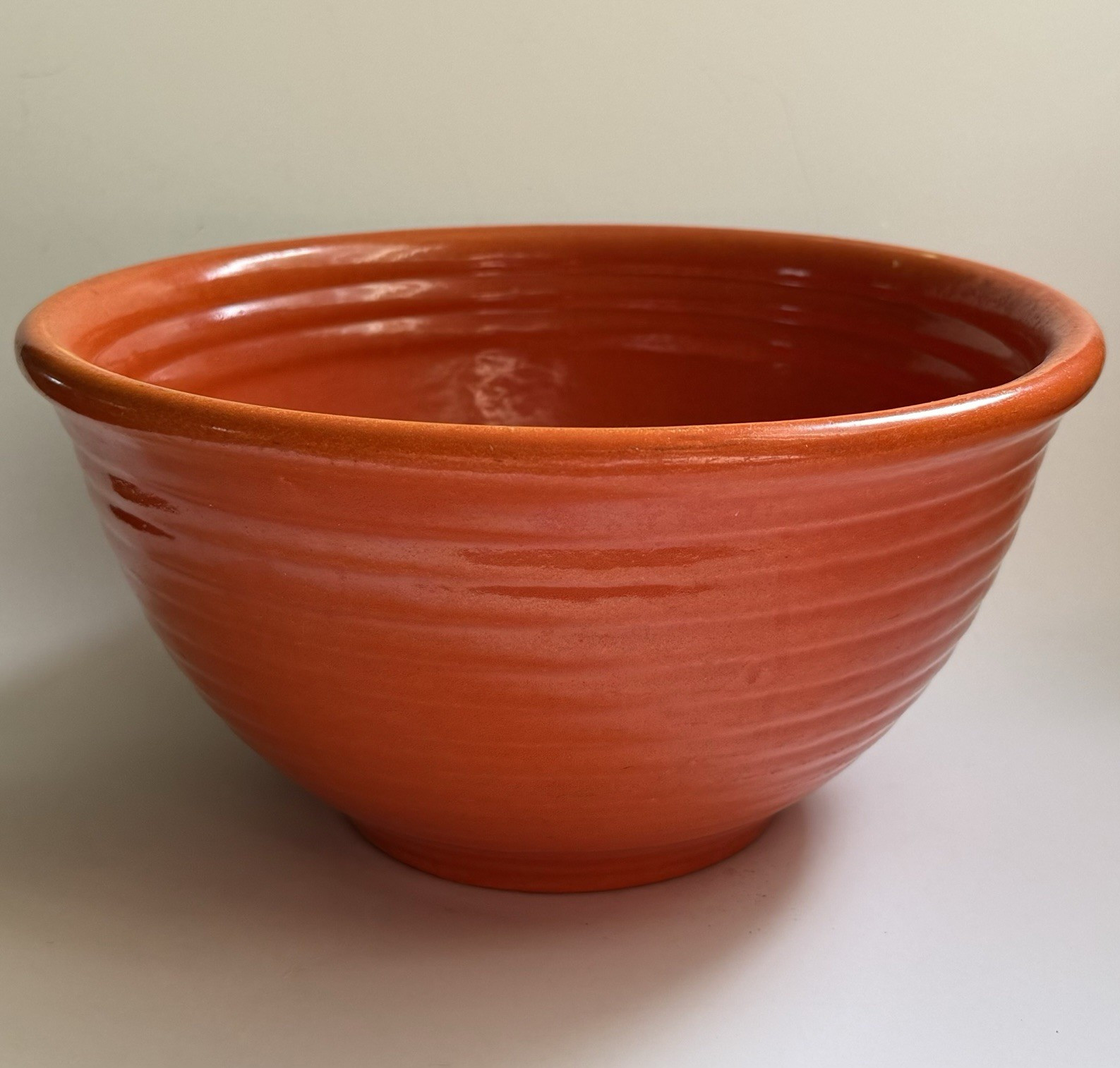 Bauer Orange Ceramic Round Bowl 9 in Diameter