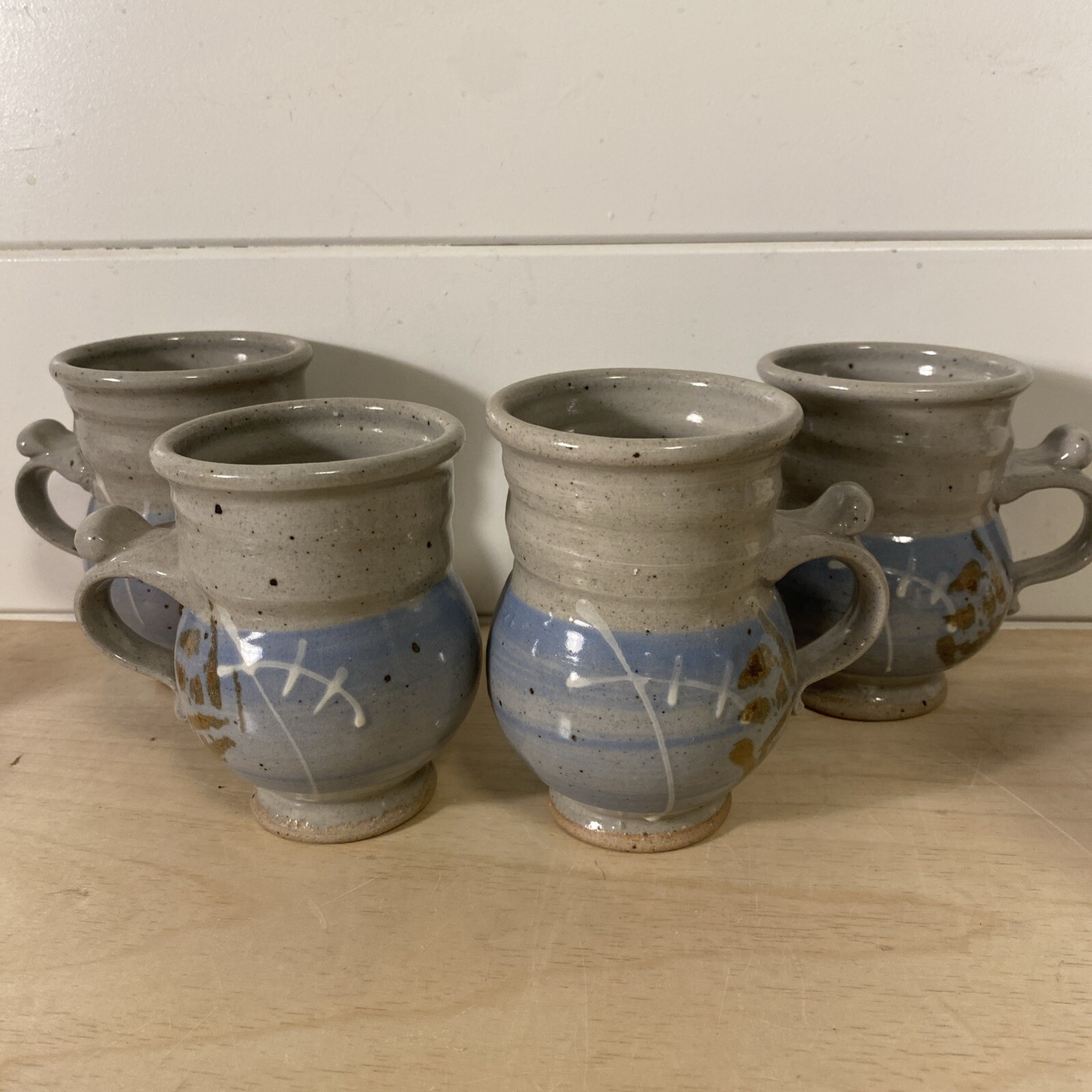 4 Beautiful Handmade Pottery Coffee Cups Signed Blue Brown White Tan E.C.
