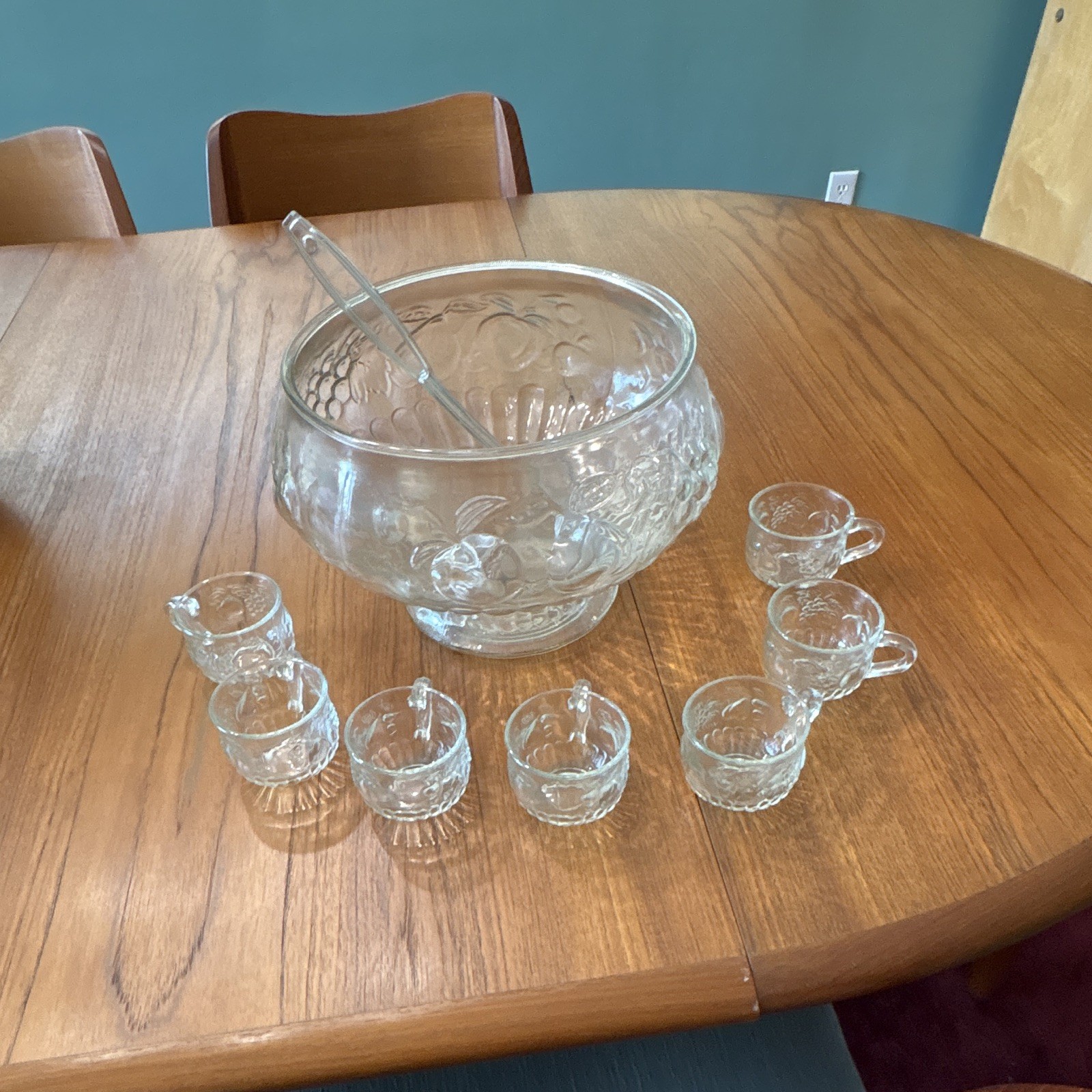 Jeannette Glass punch bowl set in the “Fruit Clear” pattern.