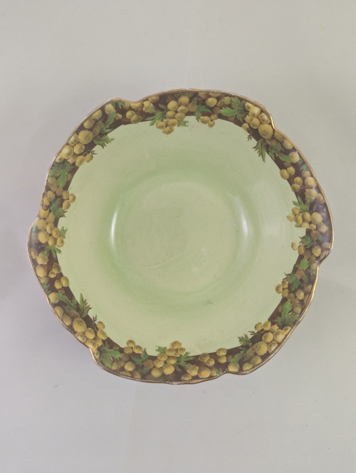 Vintage Royal Winton hand-painted porcelain decorative bowl with a floral border