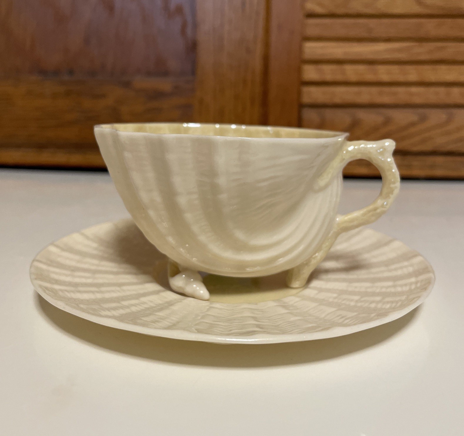 BELLEEK Neptune Yellow Shell Cup and Saucer 4th Gen Green Mark from 1946 -1955