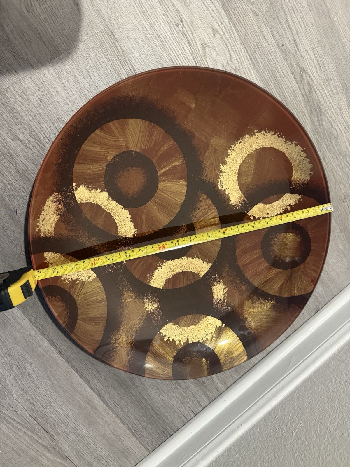 25-inch round platter made of hand-painted and fused glass
