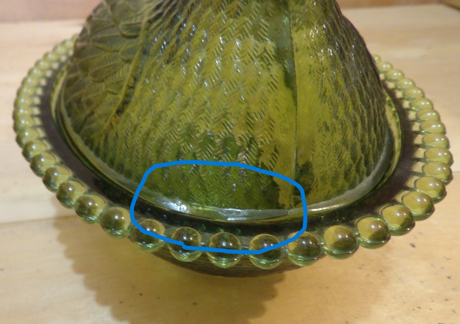 1 Indiana Glass Olive Green Hen on a Nest. 7″L x 5½”W x 5¼”H. There is one Chip