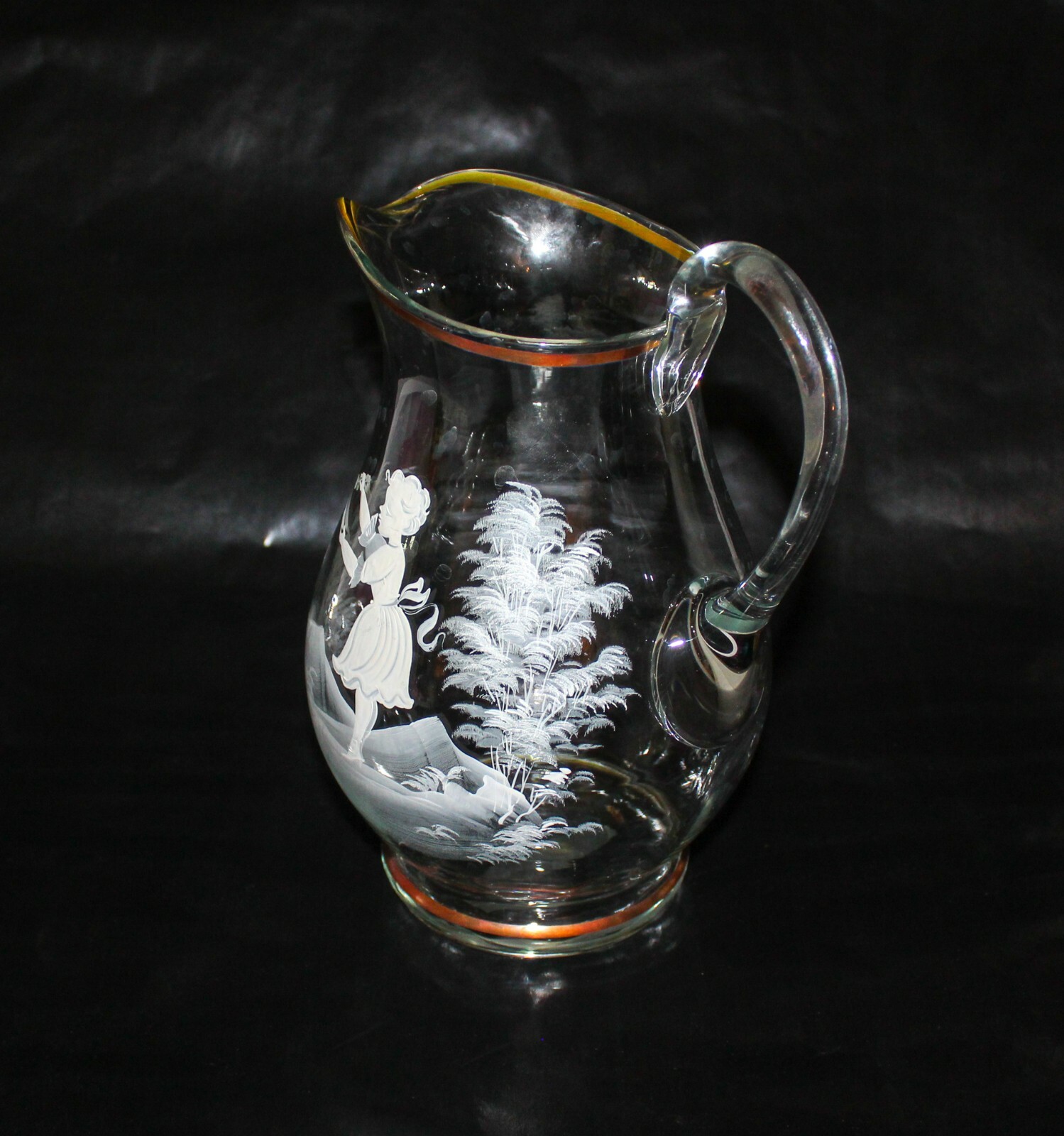 Mary Gregory Clear Glass 9 3/4″ Tall Handled Pitcher Hard to Find Version