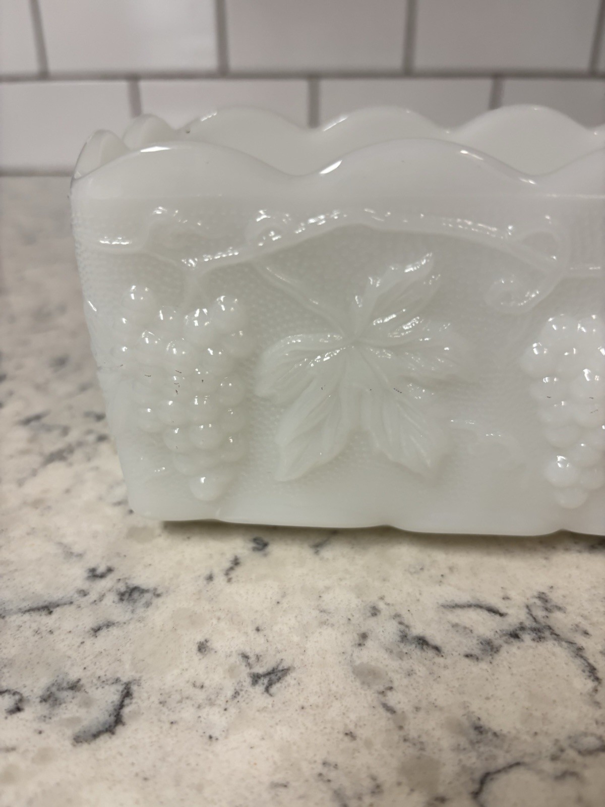 Anchor Hocking Fire King milk glass rectangular dish with grape pattern.