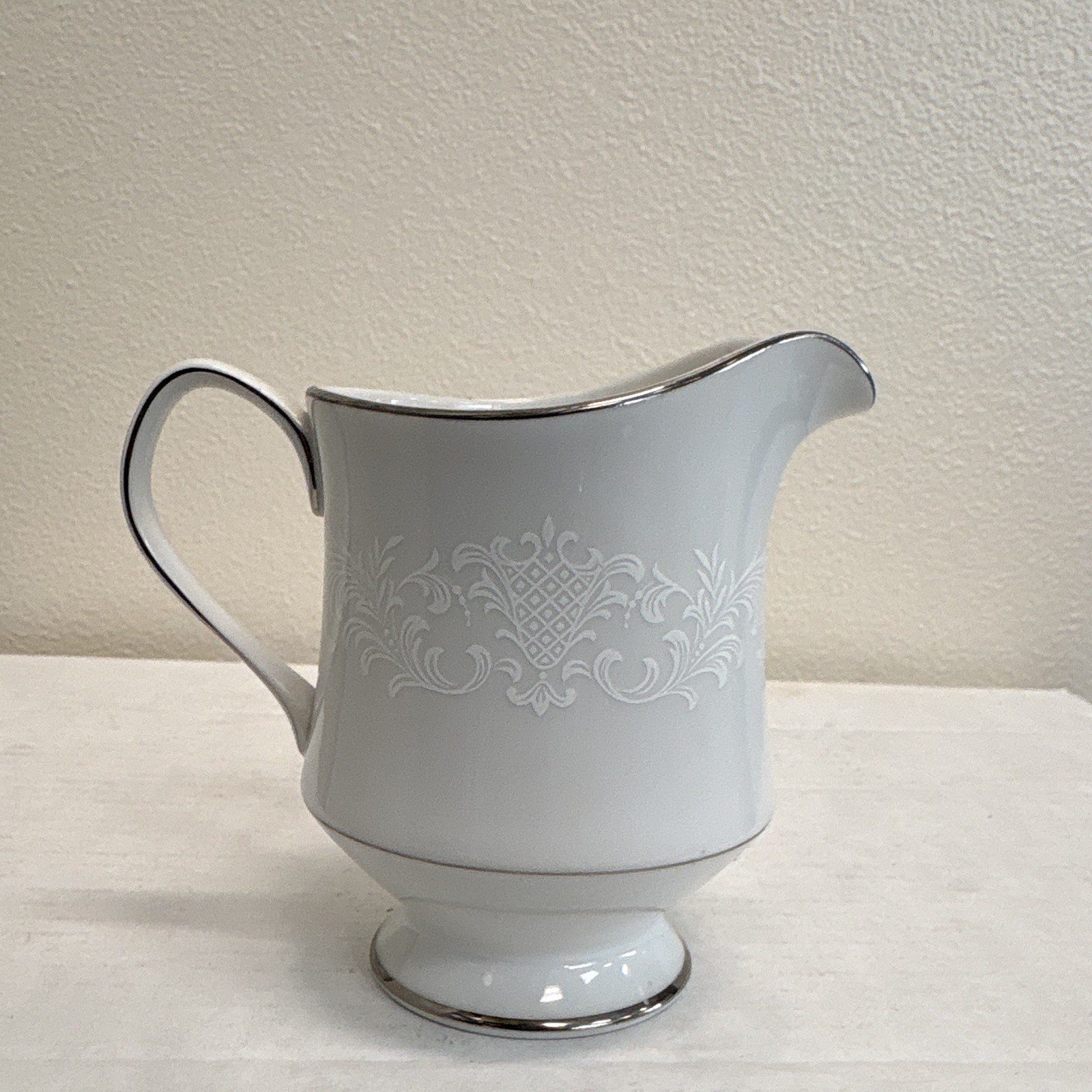 White Sango China Japan Set With White Engravings With Black Rims