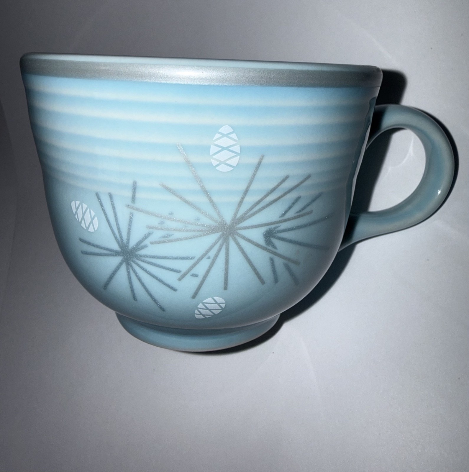 Fiesta Atomic Pine teacup and saucer on Sky