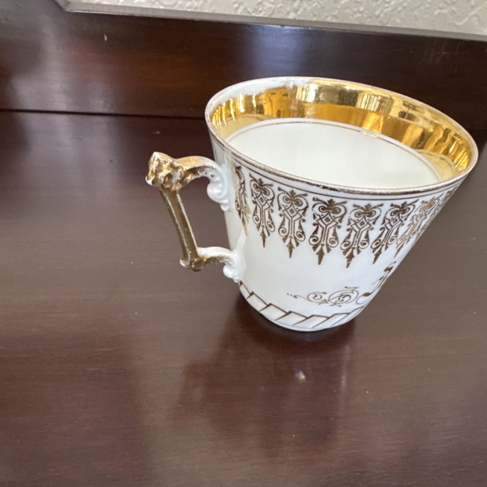 Gold and White Porcelain Cup & Saucer Set, Four-Piece Glossy Finish