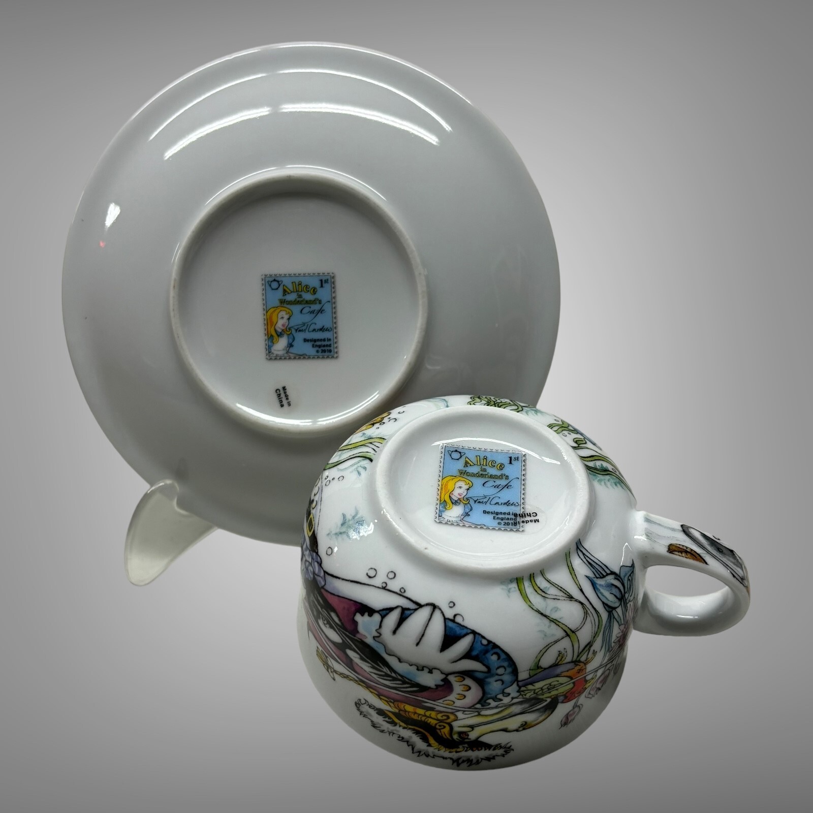 New 2010 Paul Cardew Alice in Wonderland Cafe Teacup & Saucers Set of 2 England