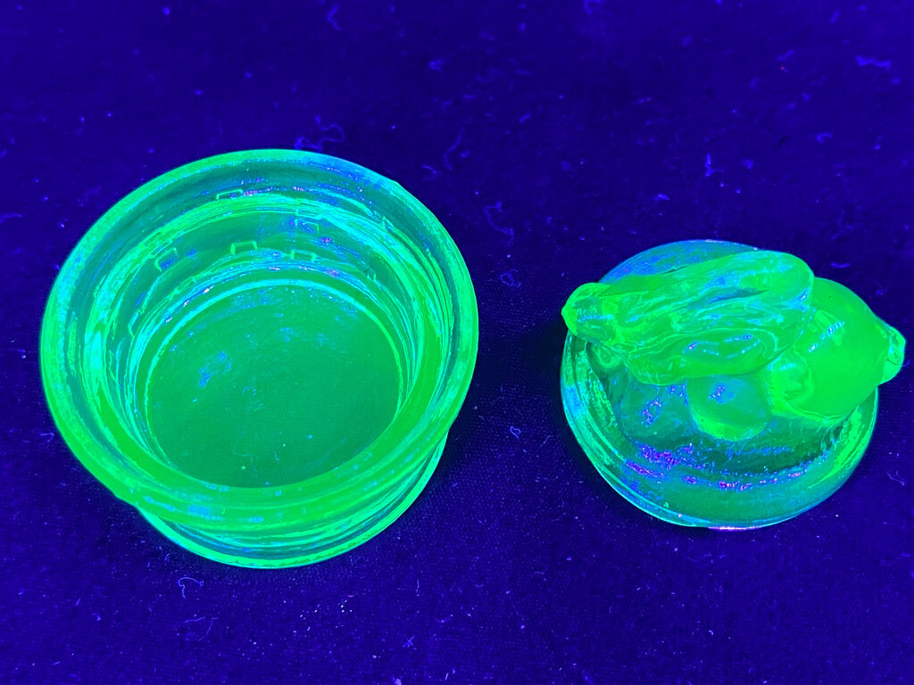 Green Vaseline uranium glass bunny rabbit on nest basket Easter glows teal blue