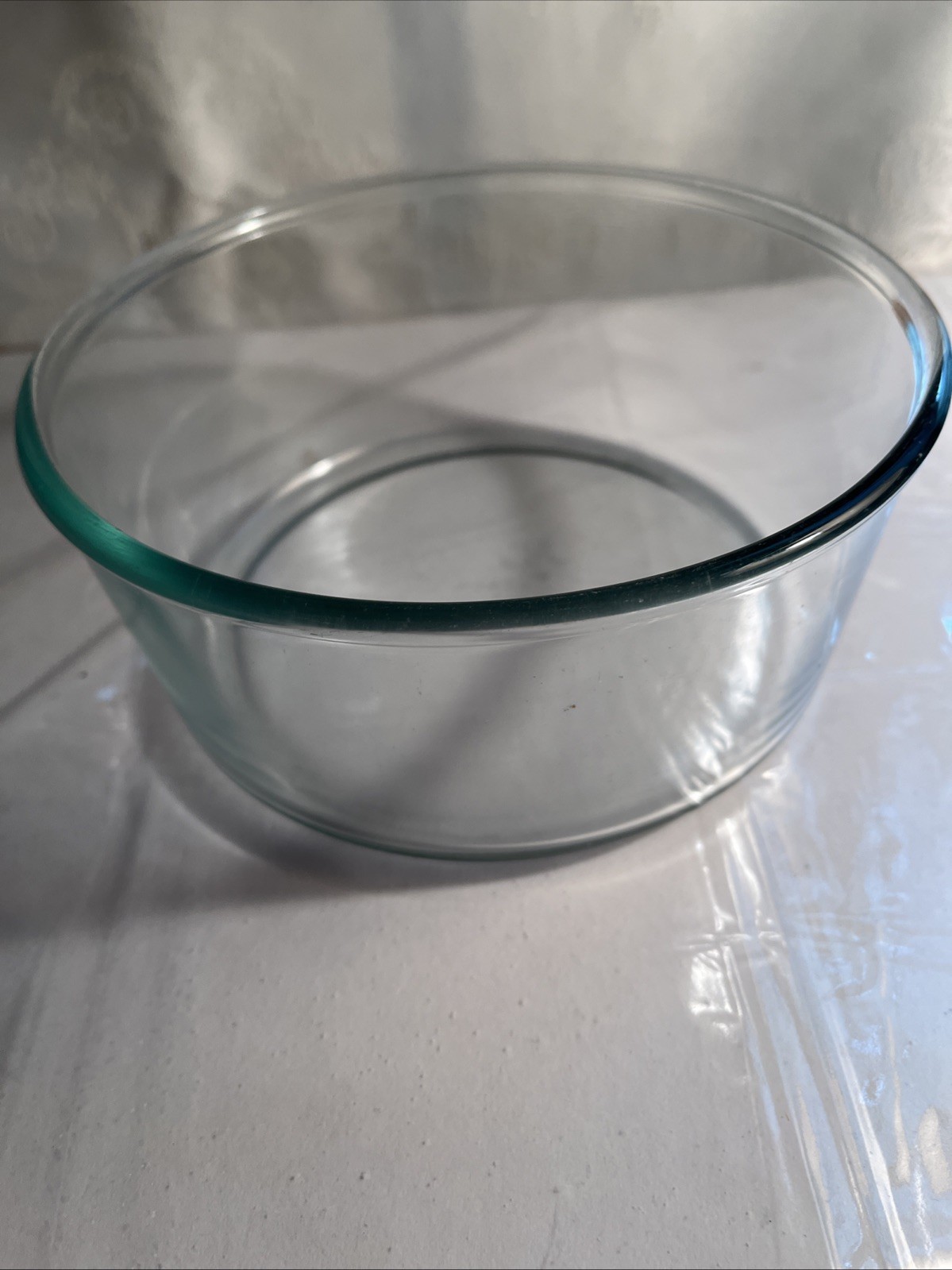 pyrex mixing bowl 7 inch diameter 3 inches deep, blue tint Lip England